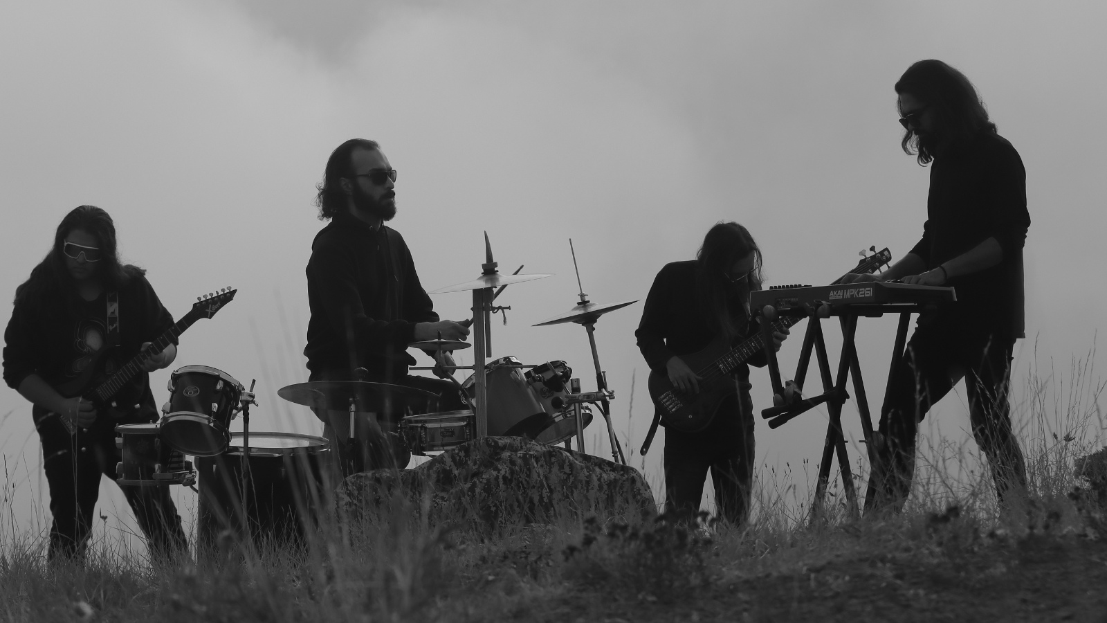 An Australian band mid-set under stage lights